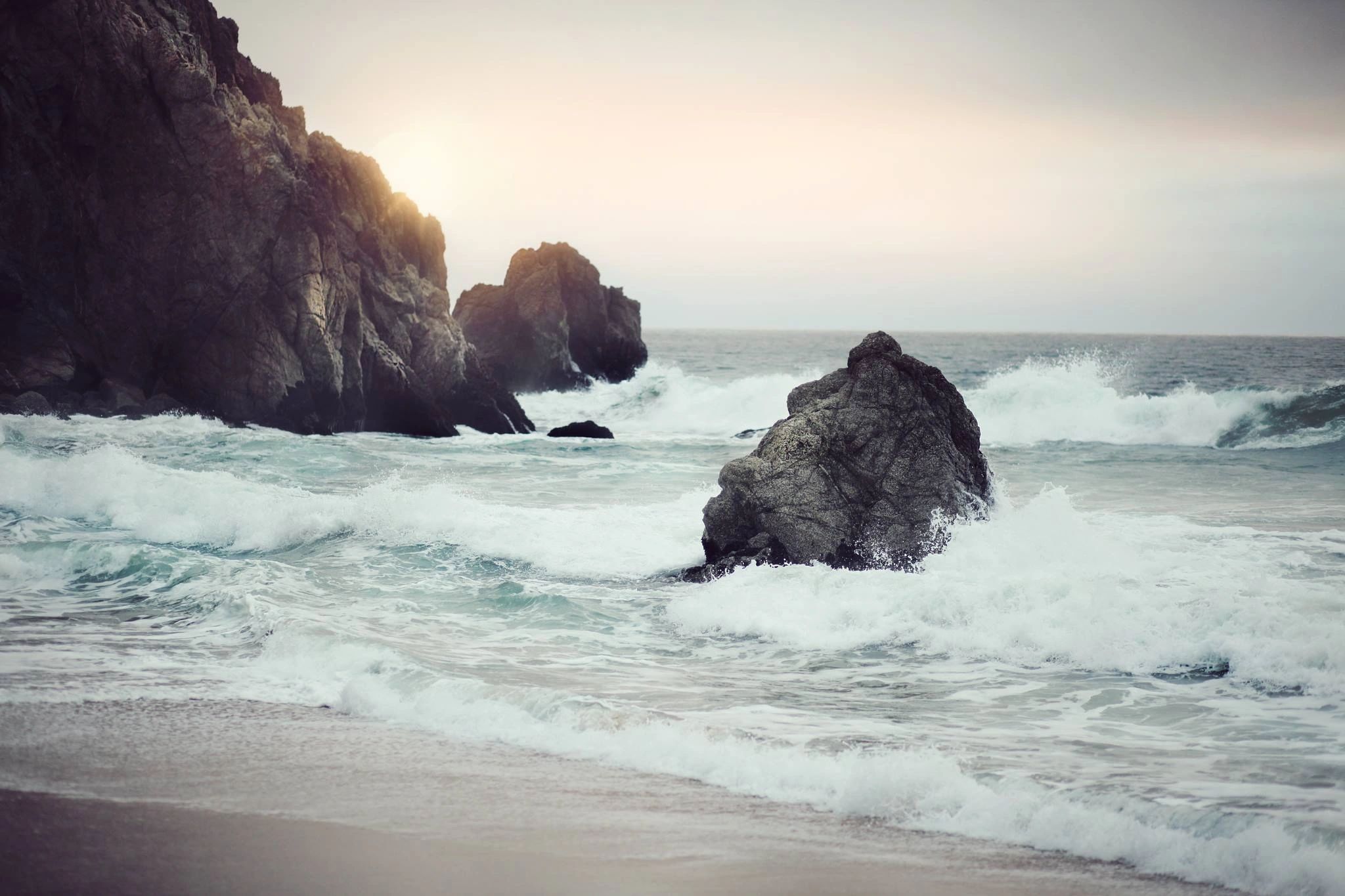 Waves crashing against rocks